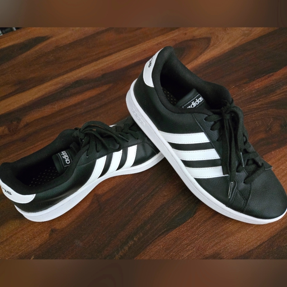 Adidas Women's 9.5 Black Sneakers with White Stripes